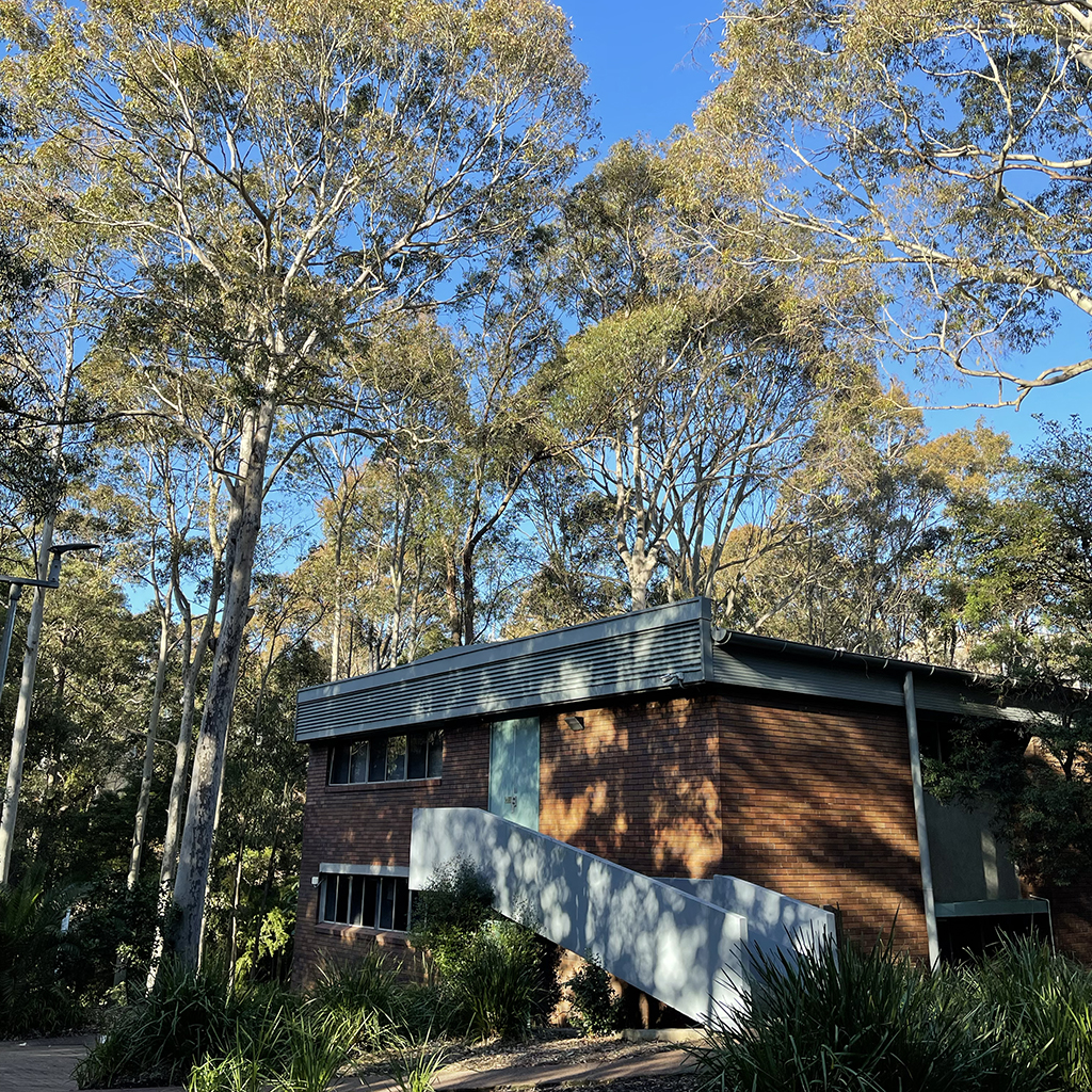 A building with trees in the background