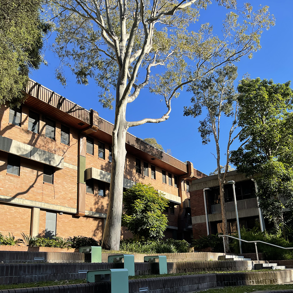 A building with trees in the background